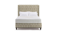 Upholstered bed in Fabric featuring a beige and cream damask pattern.