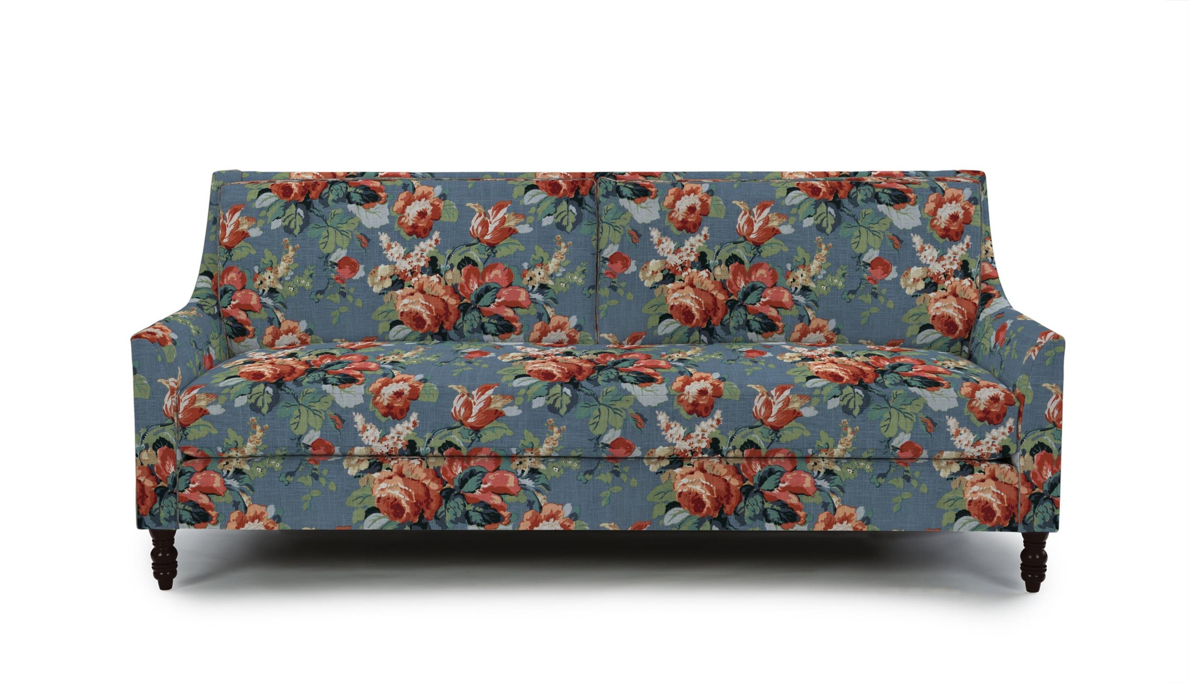 Sofa in Floral patterned fabric with red, white, and green  on a blue background