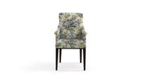Chair in fabric with a large floral pattern featuring colors such as lavender, purple, green, pale blue, and pink.