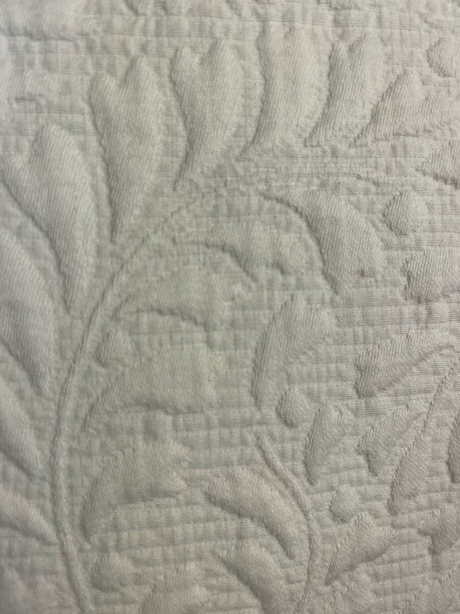 Close-up of textured fabric with leaf pattern