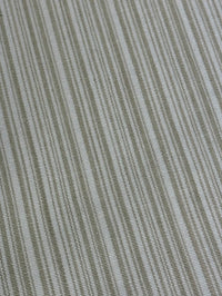 Close up of Beige striped fabric intended for use in home decor and upholstery.