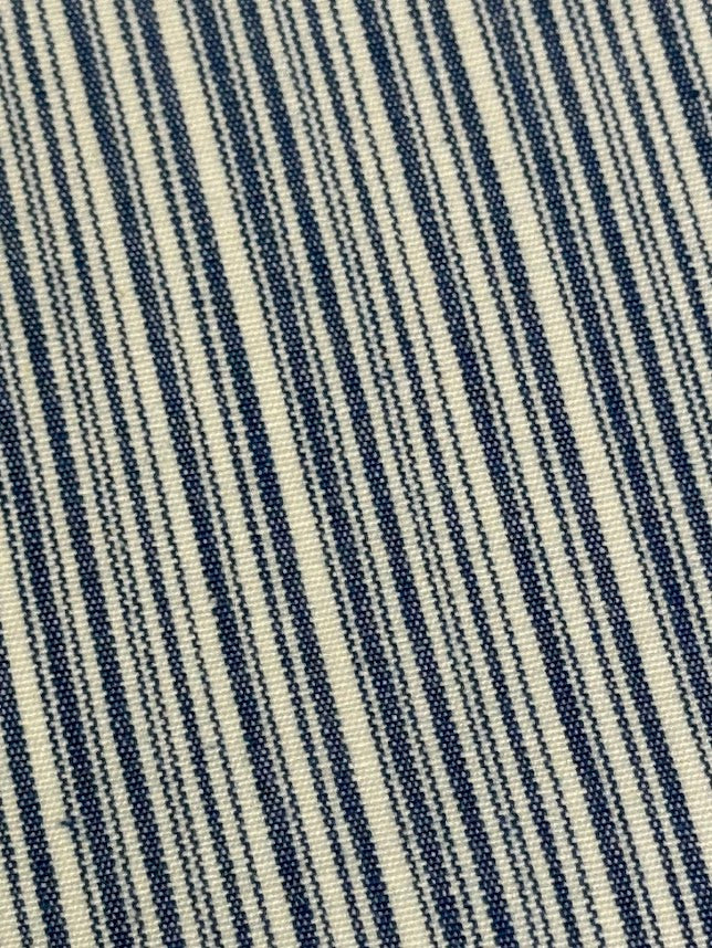 Close-up of blue and white striped fabric texture