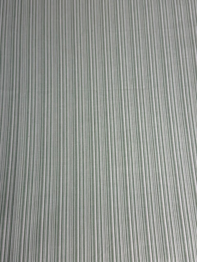 fabric featuring a small-scale green stripe pattern.