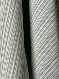 Close-up of green and white striped fabric 