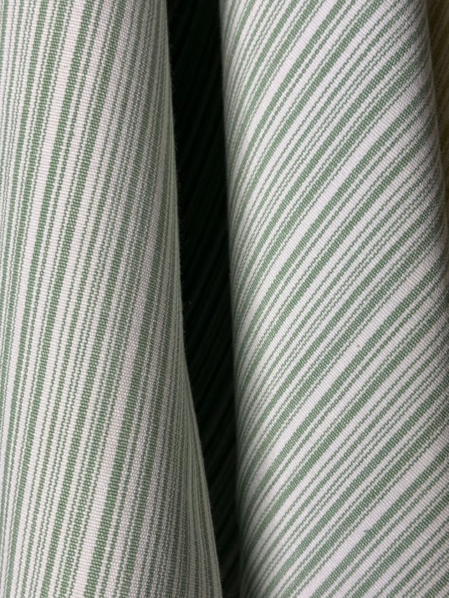 Close-up of green and white striped fabric 