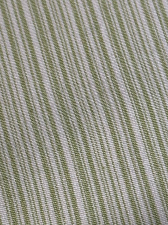 Close-up of green and white striped fabric texture
