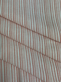 fabric featuring a small scale pink stripe pattern.
