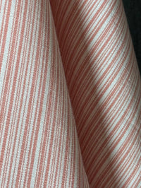 Close-up of pink and white striped fabric