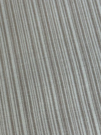  fabric featuring a small scale striped pattern in lavender tones