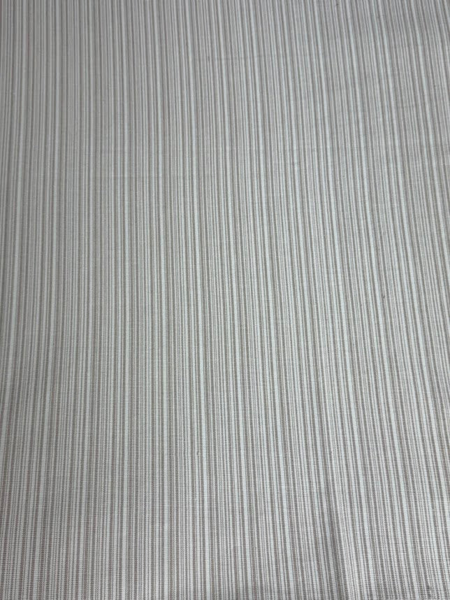  fabric featuring a small scale striped pattern in lavender tones