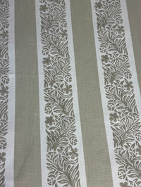 Fabric with floral stripe pattern on a plain background