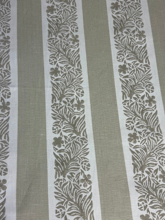 Fabric with floral stripe pattern on a plain background
