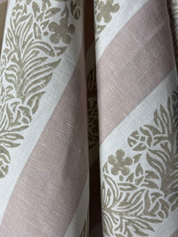 Close-up of fabric with floral patterns in lavender and white