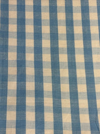 A close-up view of a fabric with a small checkered pattern in French Blue color.
