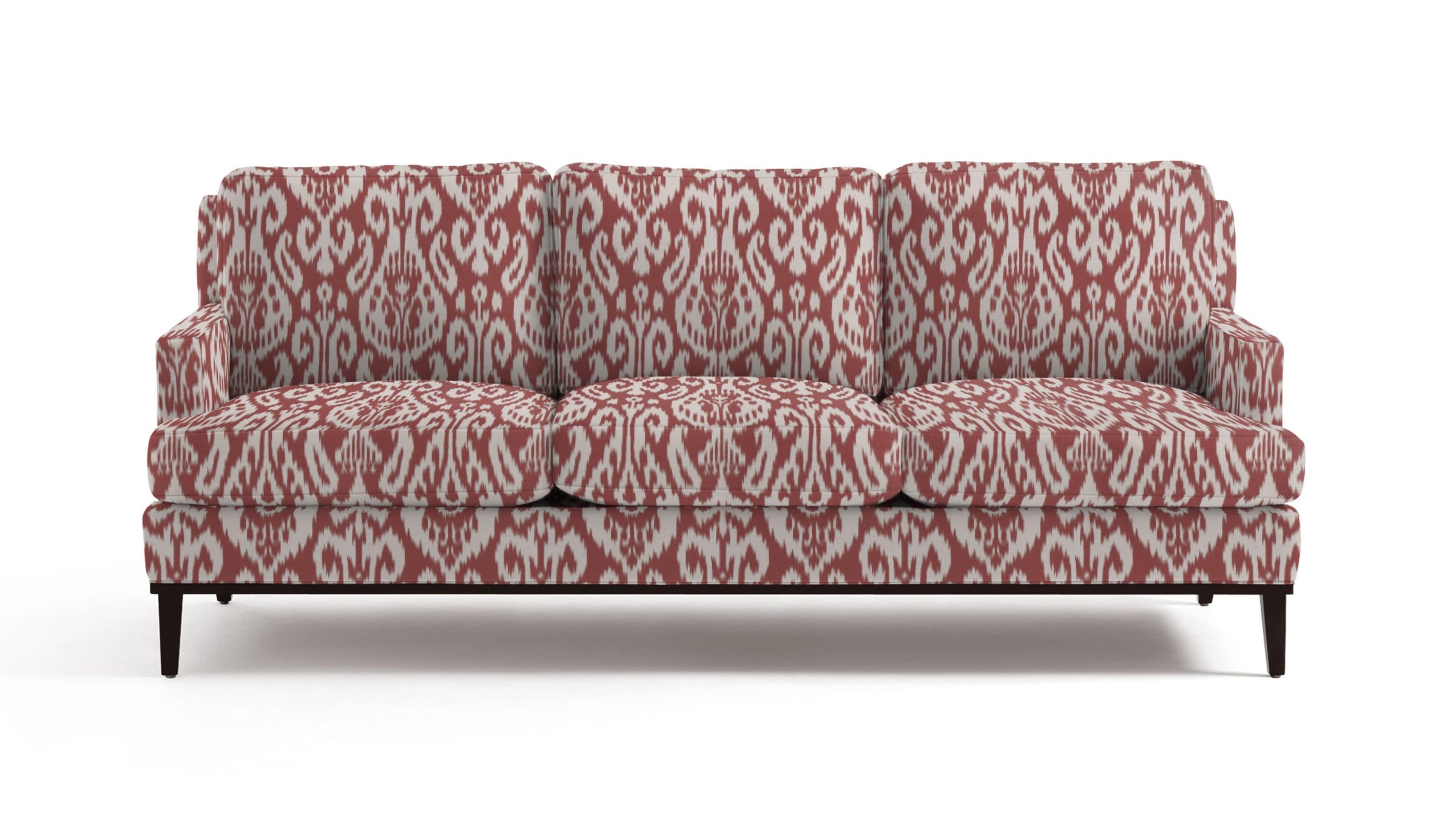 Sofa in fabric featuring a red and pink damask pattern.