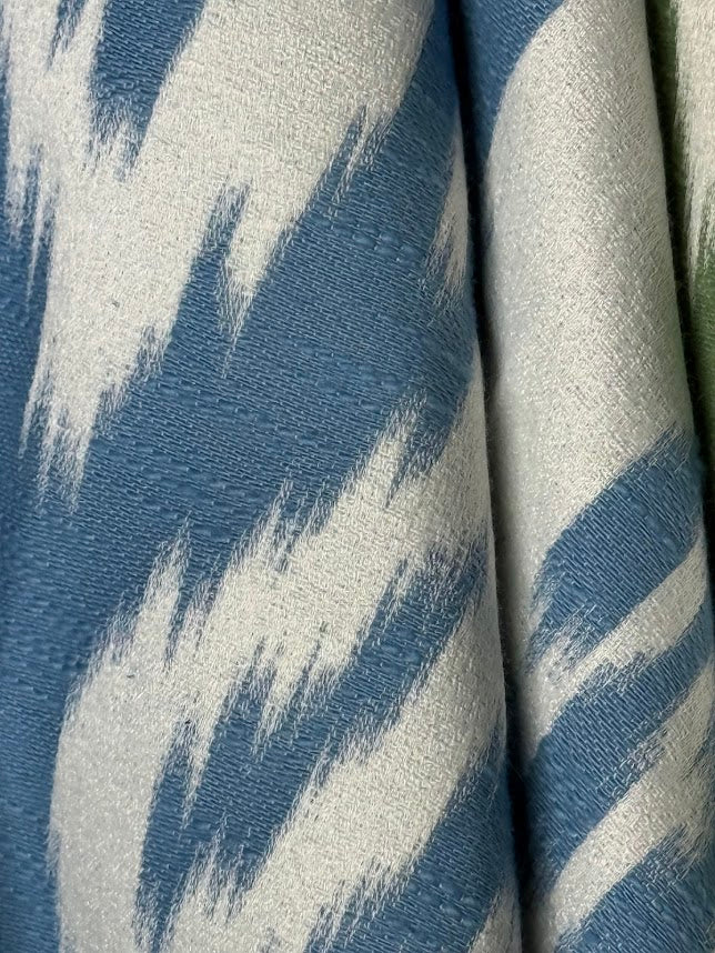Close-up of fabric with blue and white abstract pattern