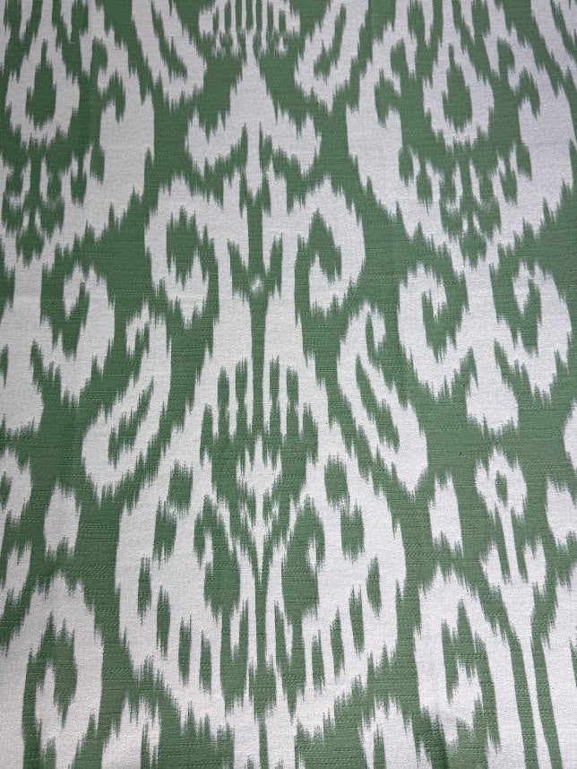 Patterned fabric with green and white design