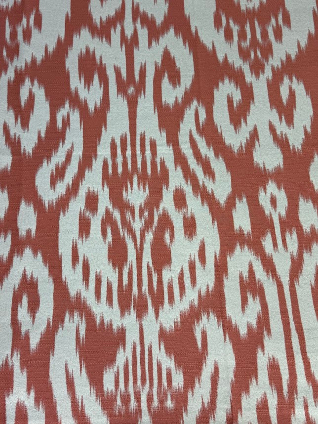 Fabric with abstract damask pattern in pink and cream