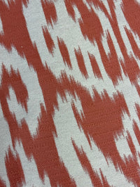 Fabric with abstract damask pattern in pink and cream