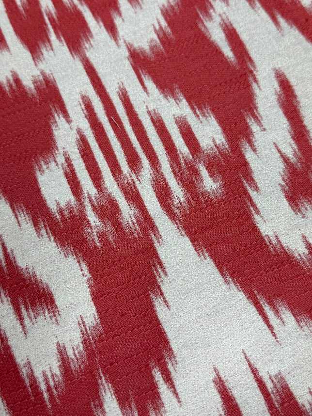 Close-up of red and white patterned fabric