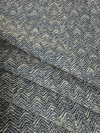 Textured fabric with a zigzag pattern in blue and white
