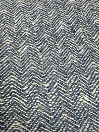 Close-up of a blue and white herringbone patterned fabric.