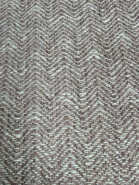 Textured fabric with a herringbone pattern in heather and white.