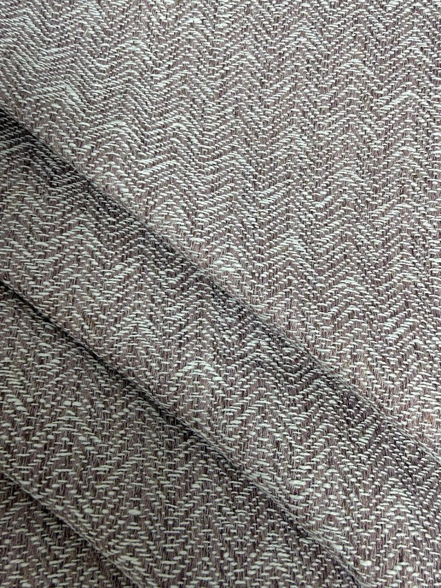 Close-up of heather herringbone fabric texture