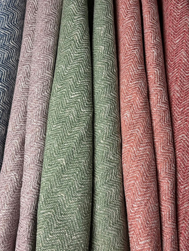 Close-up of textured fabric swatches in various colors.