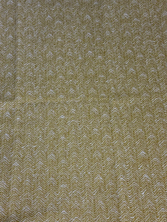 Textured fabric with a herringbone pattern in yellow color