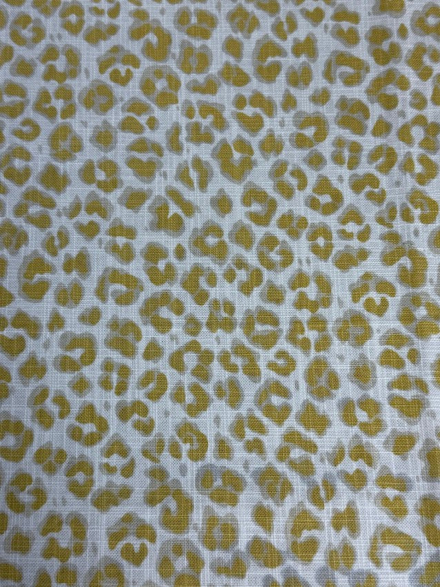Leopard print pattern on a fabric background