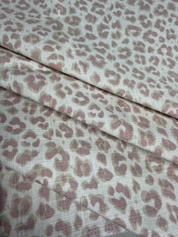 Leopard print fabric in lavender and beige
