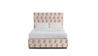 upholstered bed in fabric featuring a vertical flame stitch pattern with geometric designs in pink and white colors 