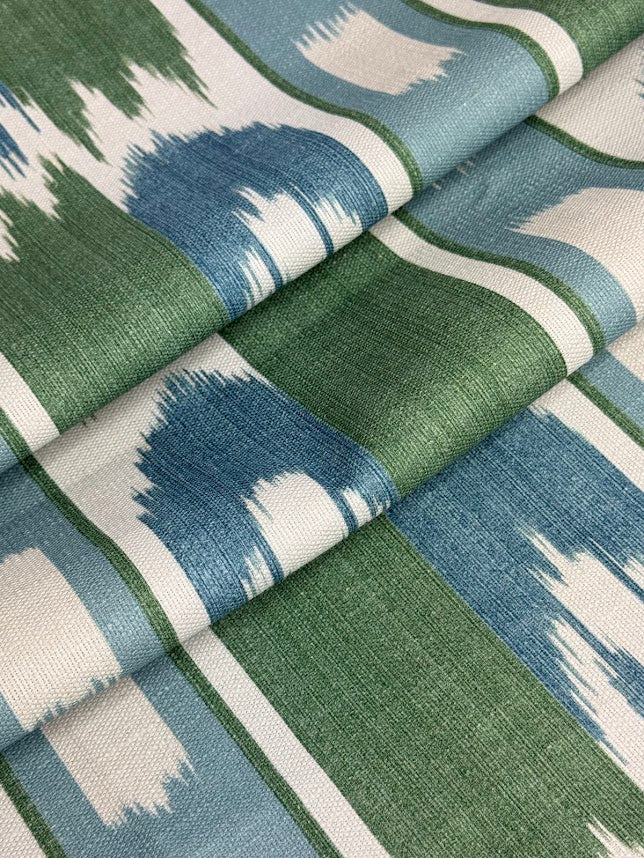 Close-up of fabric with blue, green, and white pattern