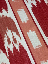 Close-up of fabric with red and white geometric pattern