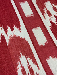 Close-up of fabric with red and white geometric pattern