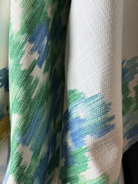 Close-up of fabric with blue and green abstract pattern