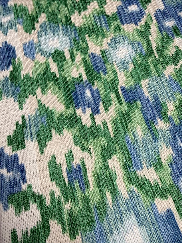 Close-up of fabric with green and blue geometric pattern