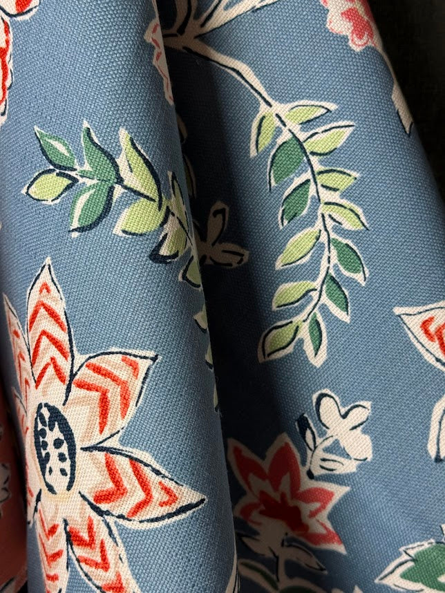 Close-up of floral fabric with blue background