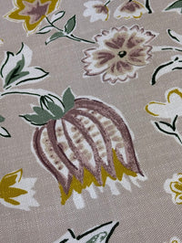 A fabric with a floral pattern featuring thistles in lavender, purple, and linen colors on a linen background.