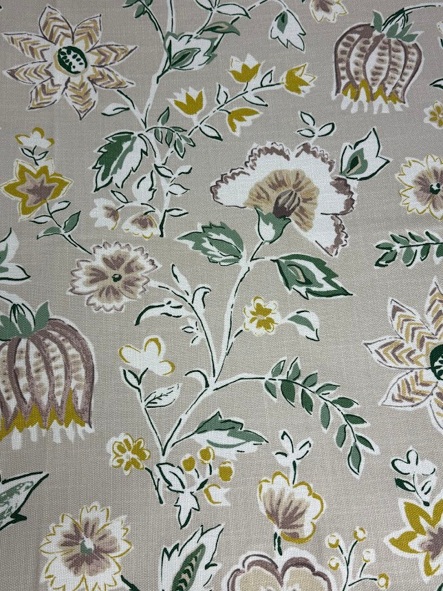A fabric with a floral pattern featuring thistles in lavender, purple, and linen colors on a linen background.