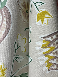 Close-up of fabric with floral pattern on beige background