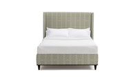 Blakely headboard and white bedding on a white background