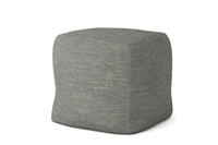 Gray cube-shaped marlow pouf on a white background