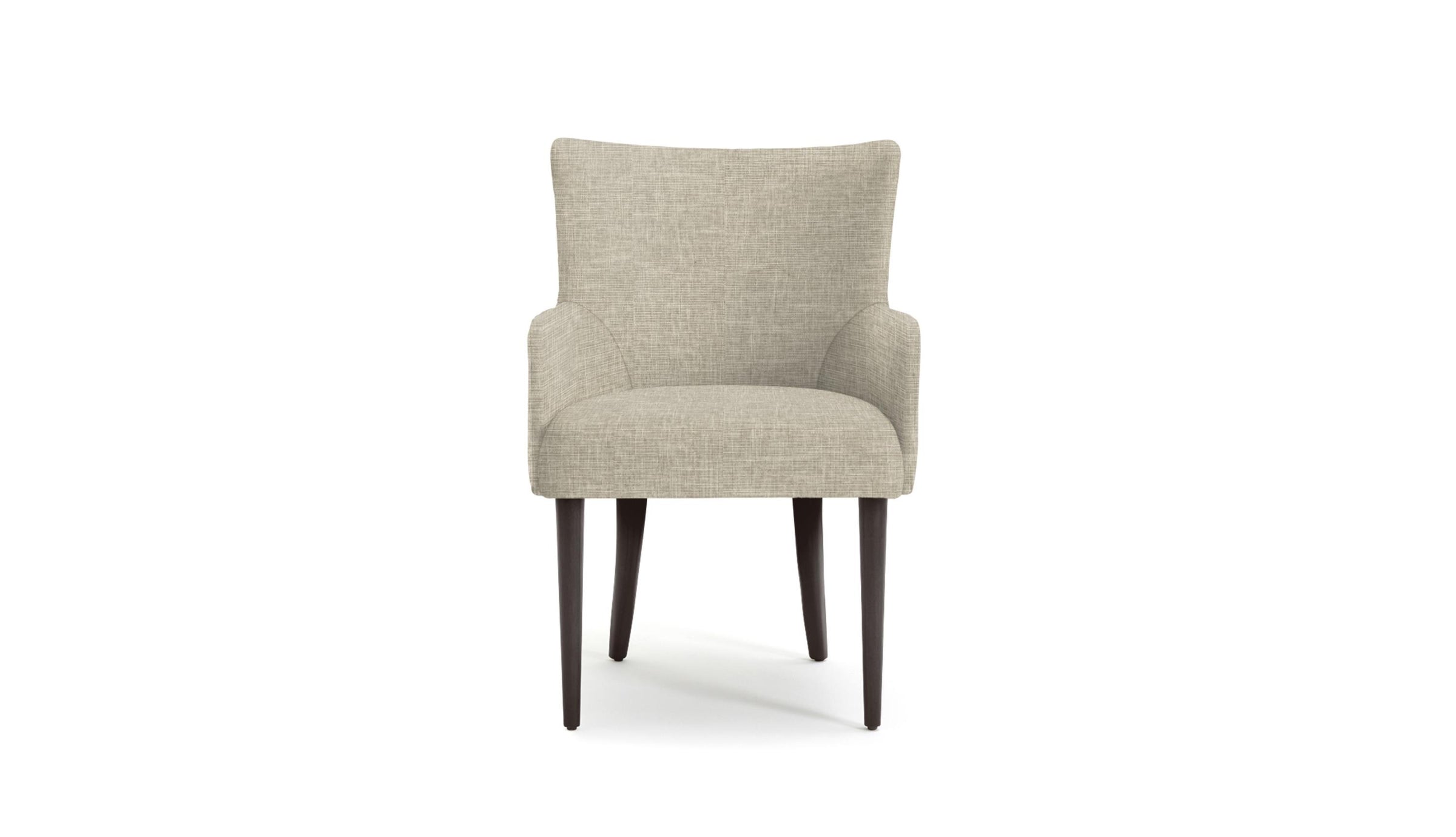 Beige upholstered maya dining chair with dark wood legs on a white background