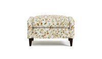 Floral-patterned Doreen ottoman on a white background