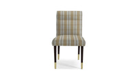 Plaid fabric in gold tones on dining chair