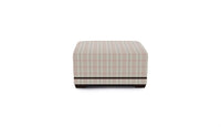 Ottoman in rose colored plaid fabric