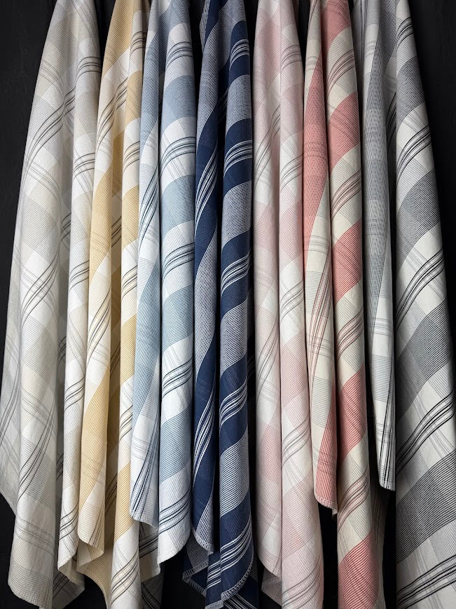 Collection of checkered fabric swatches in various colors and patterns.