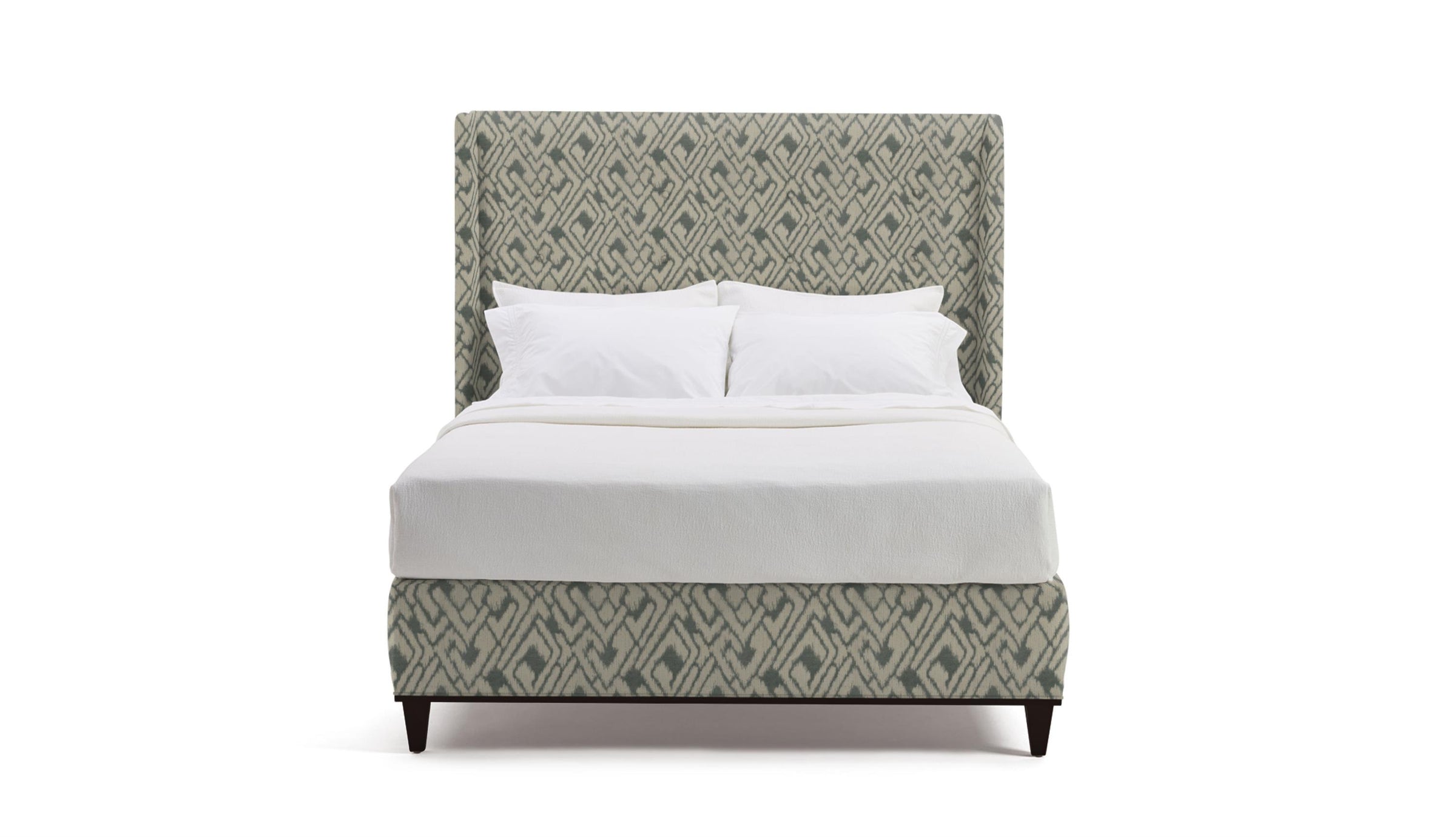 Gordon tufted patterned bed and white bedding 